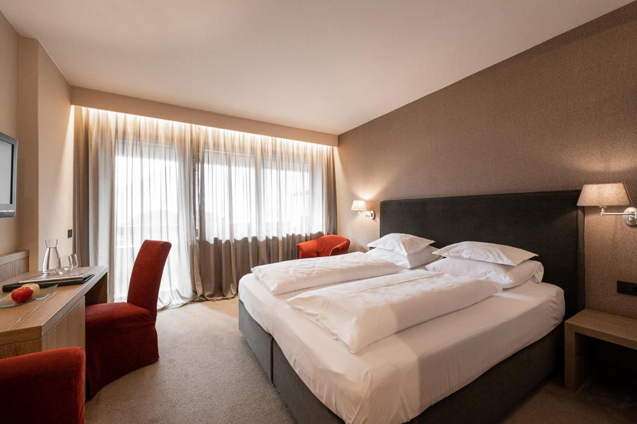 Luxe Kamer met 1 of 2 Bedden en Balkon