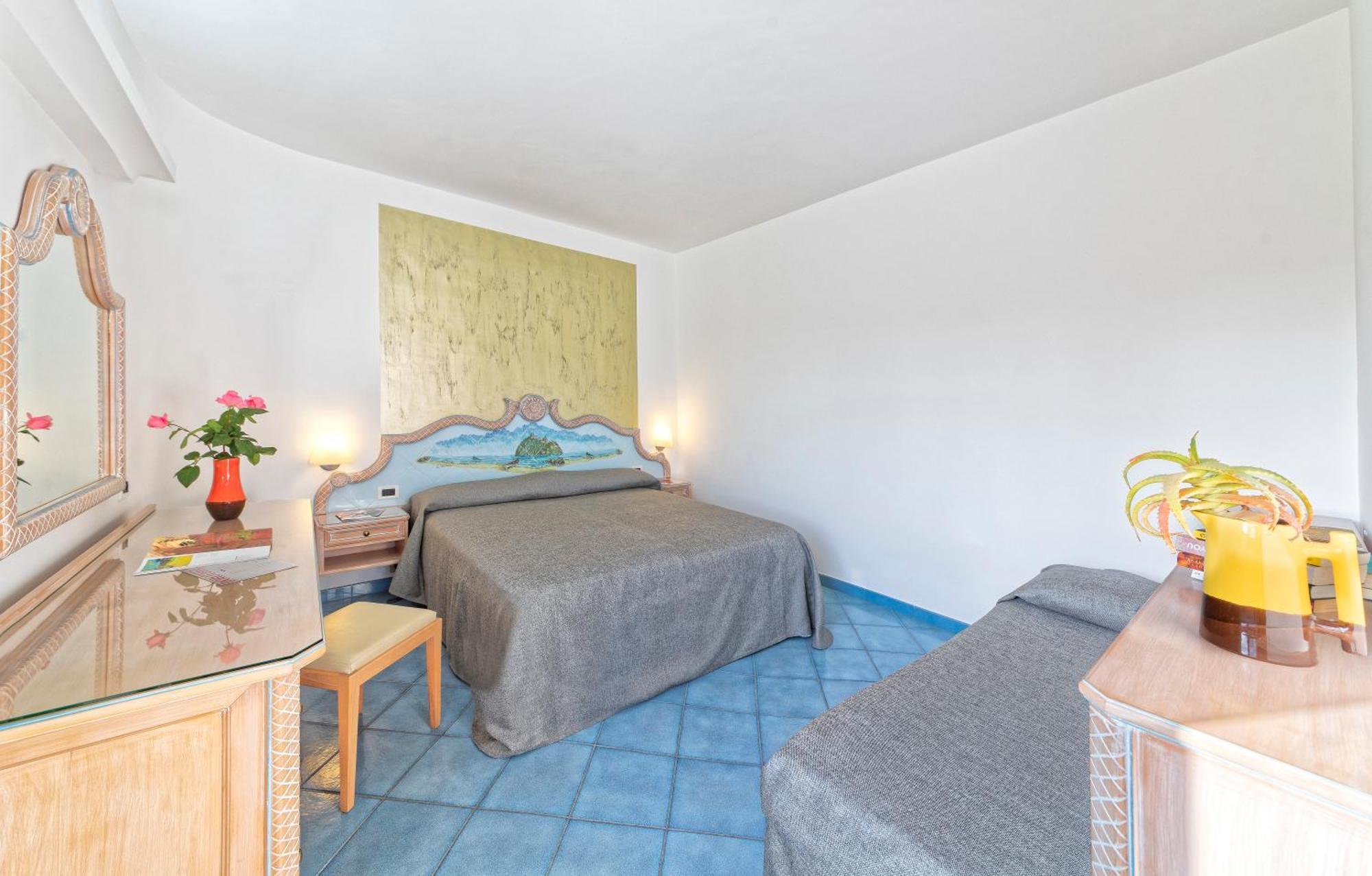 Quadruple Room (2 Adults + 2 Children)
