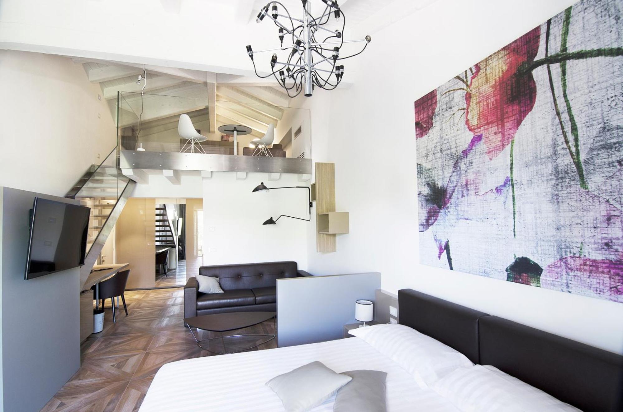 Suite mit Balkon und Gartenblick