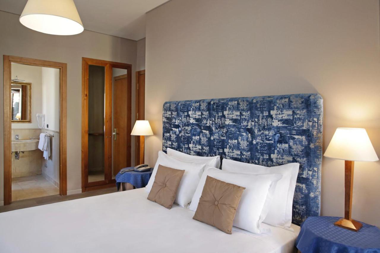 Quarto Deluxe com Cama de Casal ou 2 de Solteiro e Varanda