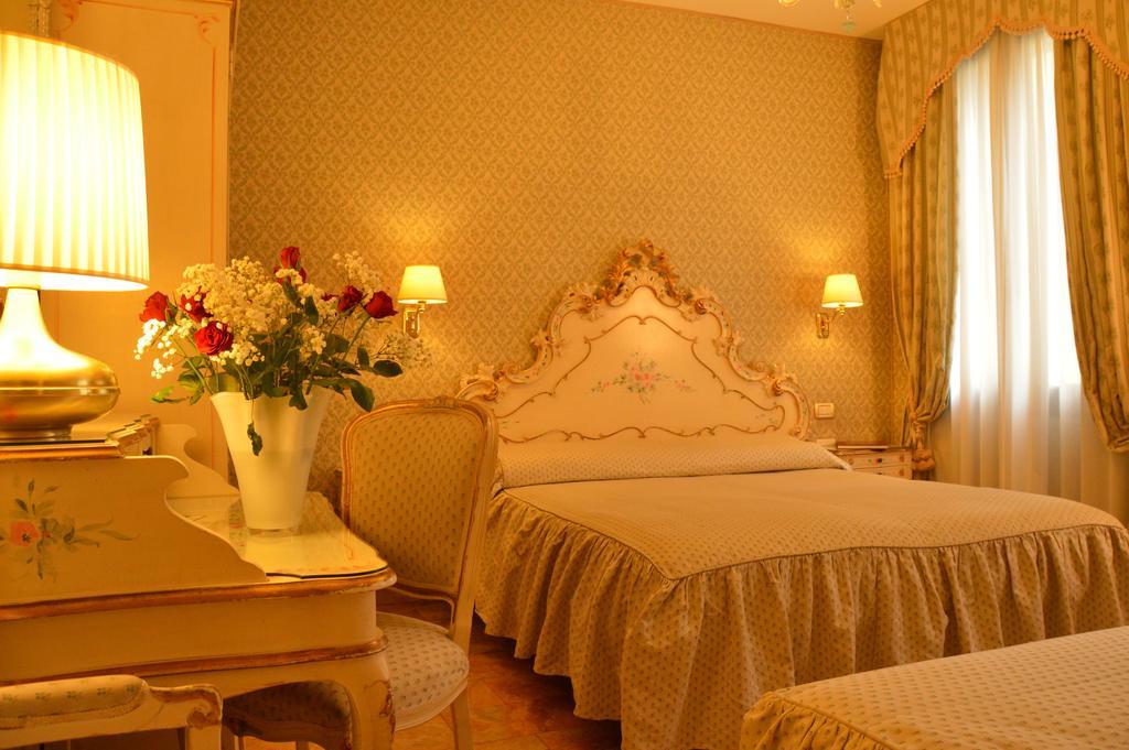 Quarto Familiar Clássico (3 Adultos)