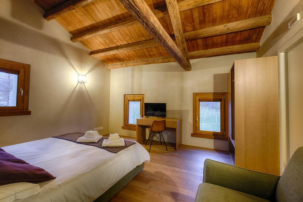 Camera Tripla con Vista Giardino