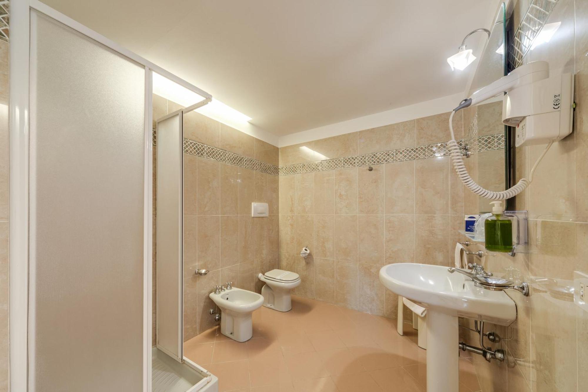 Quarto Quádruplo Superior com Vista da Cidade