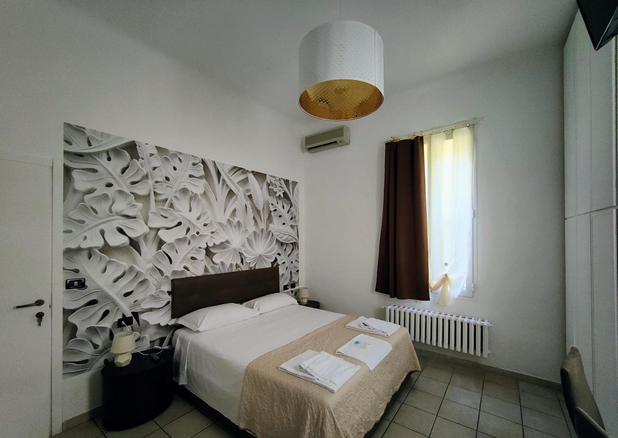Quarto Duplo com Banheiro Compartilhado