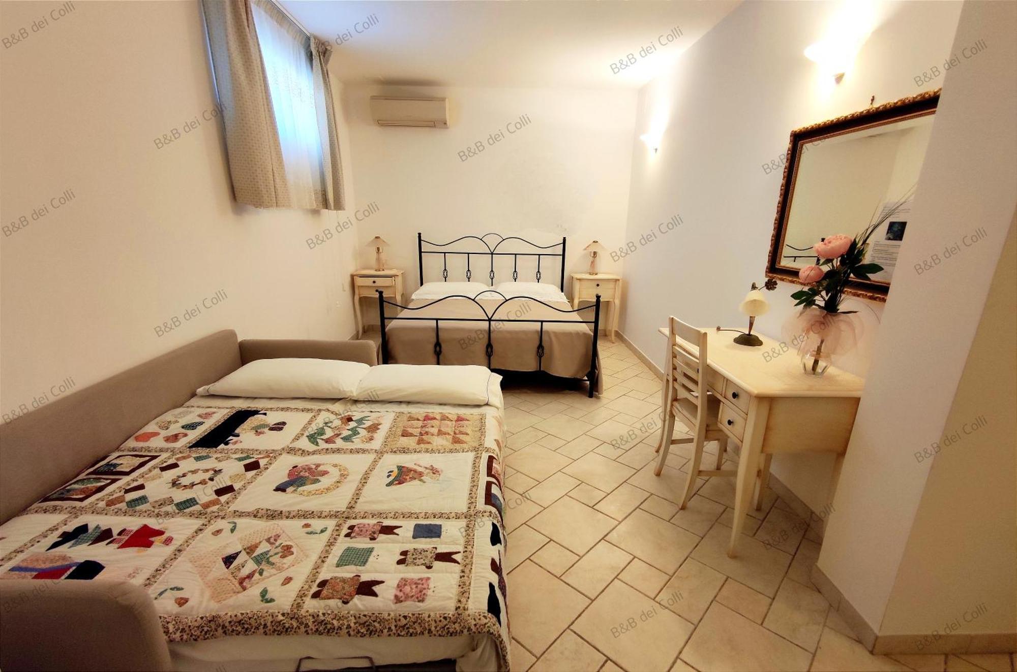 Camera Quadrupla con Bagno Privato