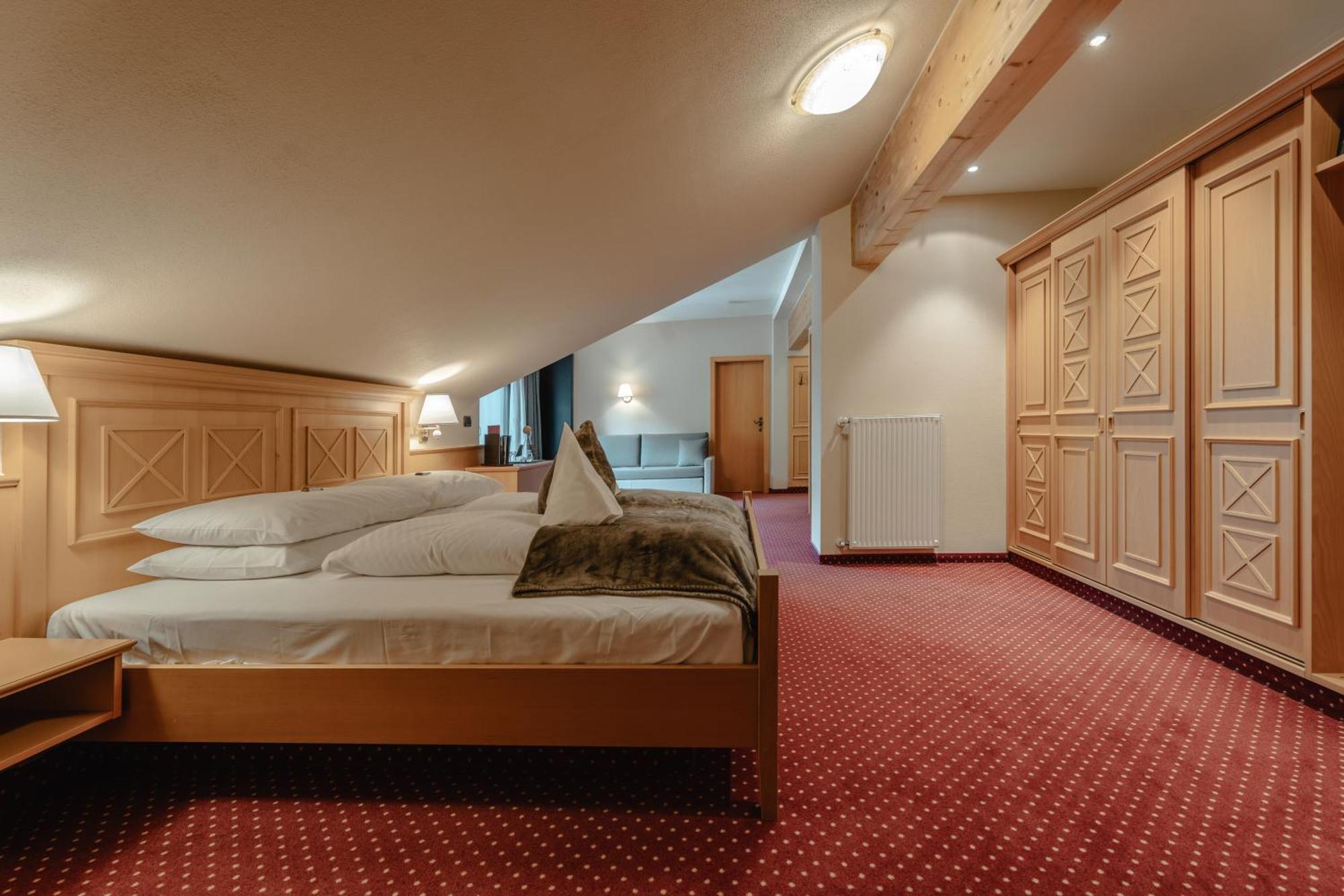 Dreibettzimmer mit Balkon
