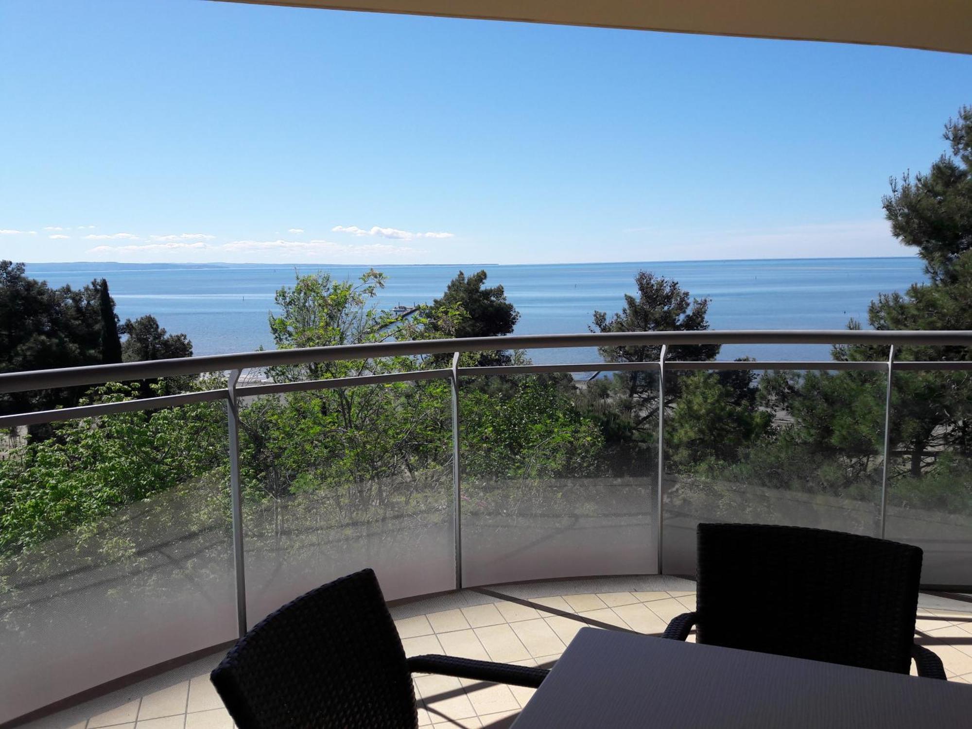 One-Bedroom Apartment with Balcony and Sea View