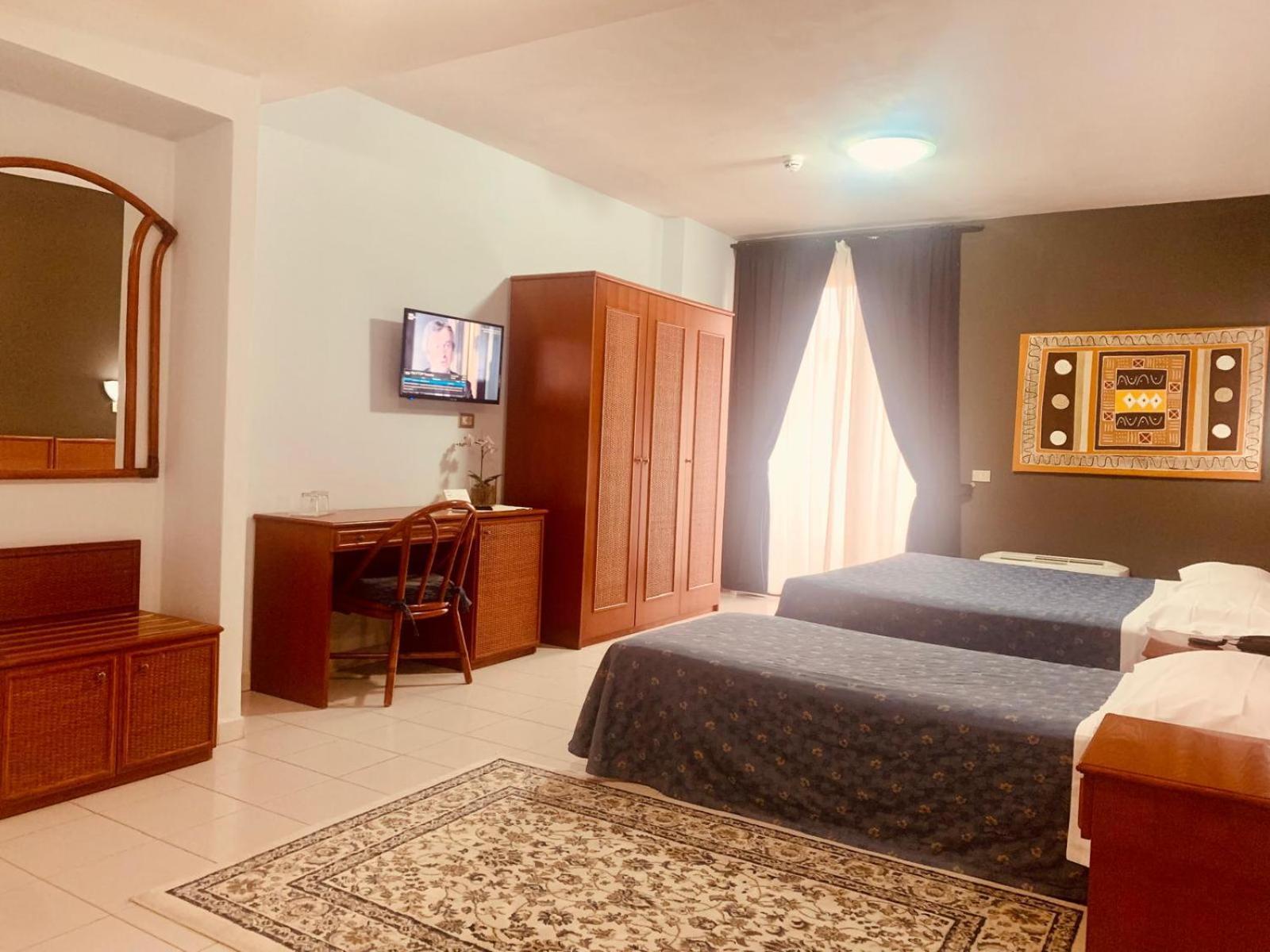 Deluxe Triple Room
