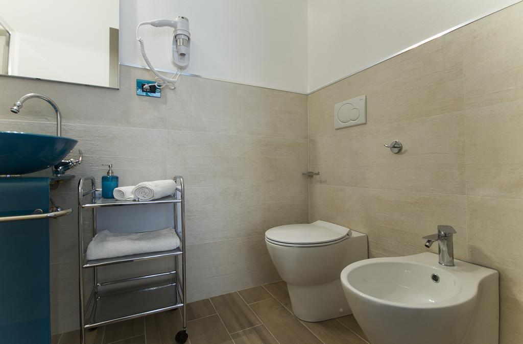 Chambre Quadruple avec Salle de Bains Privative