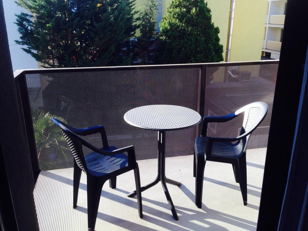 Kamer met Queensize Bed en Balkon