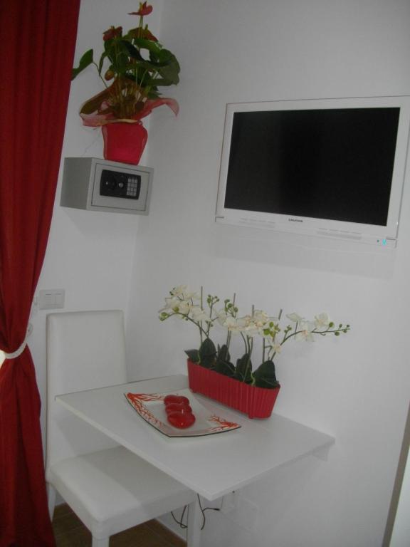 Quarto com Cama Queen-Size e Varanda