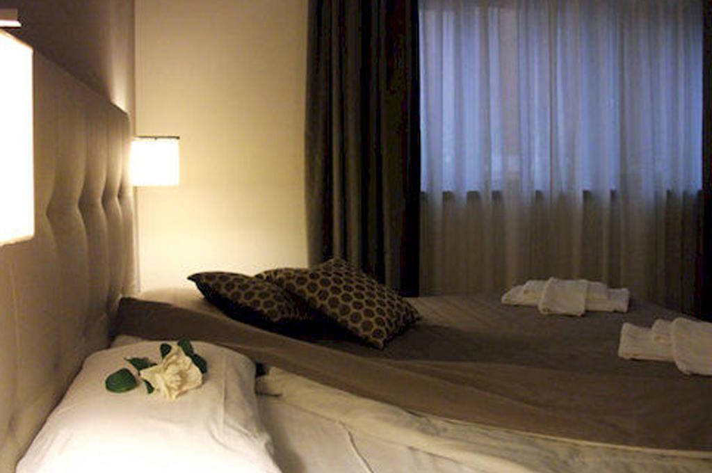 Habitación Familiar (2 adultos + 1 niño)