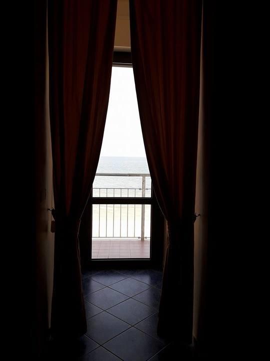 Camera Quadrupla con Vista Mare e Balcone