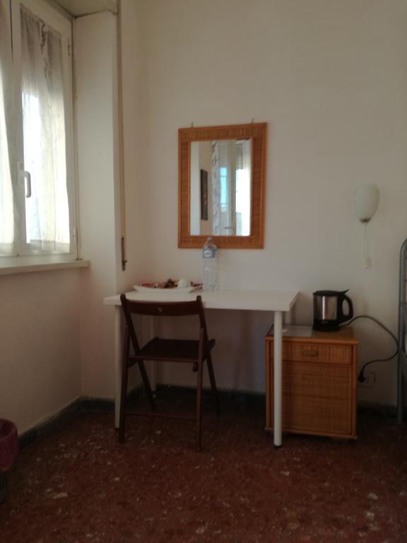 Quarto Individual com Banheiro Compartilhado