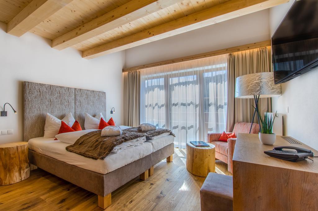 Camera Quadrupla Superior