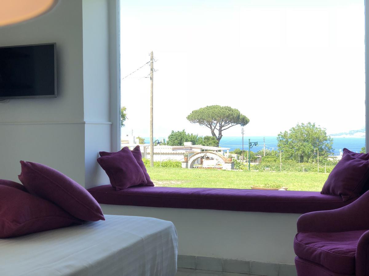 Suite met Queensize bed en Uitzicht op Zee - Eigen Tuin