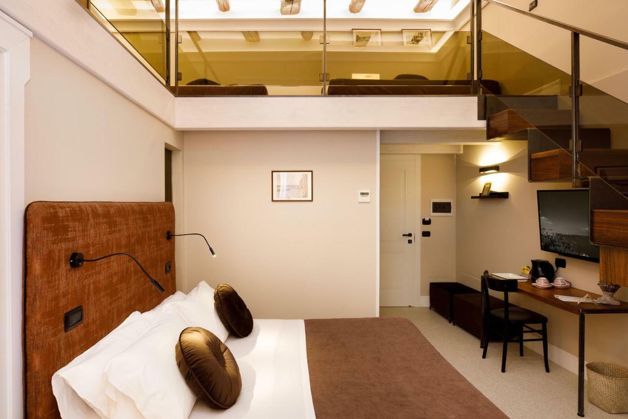 Deluxe Quadruple Room Balcony